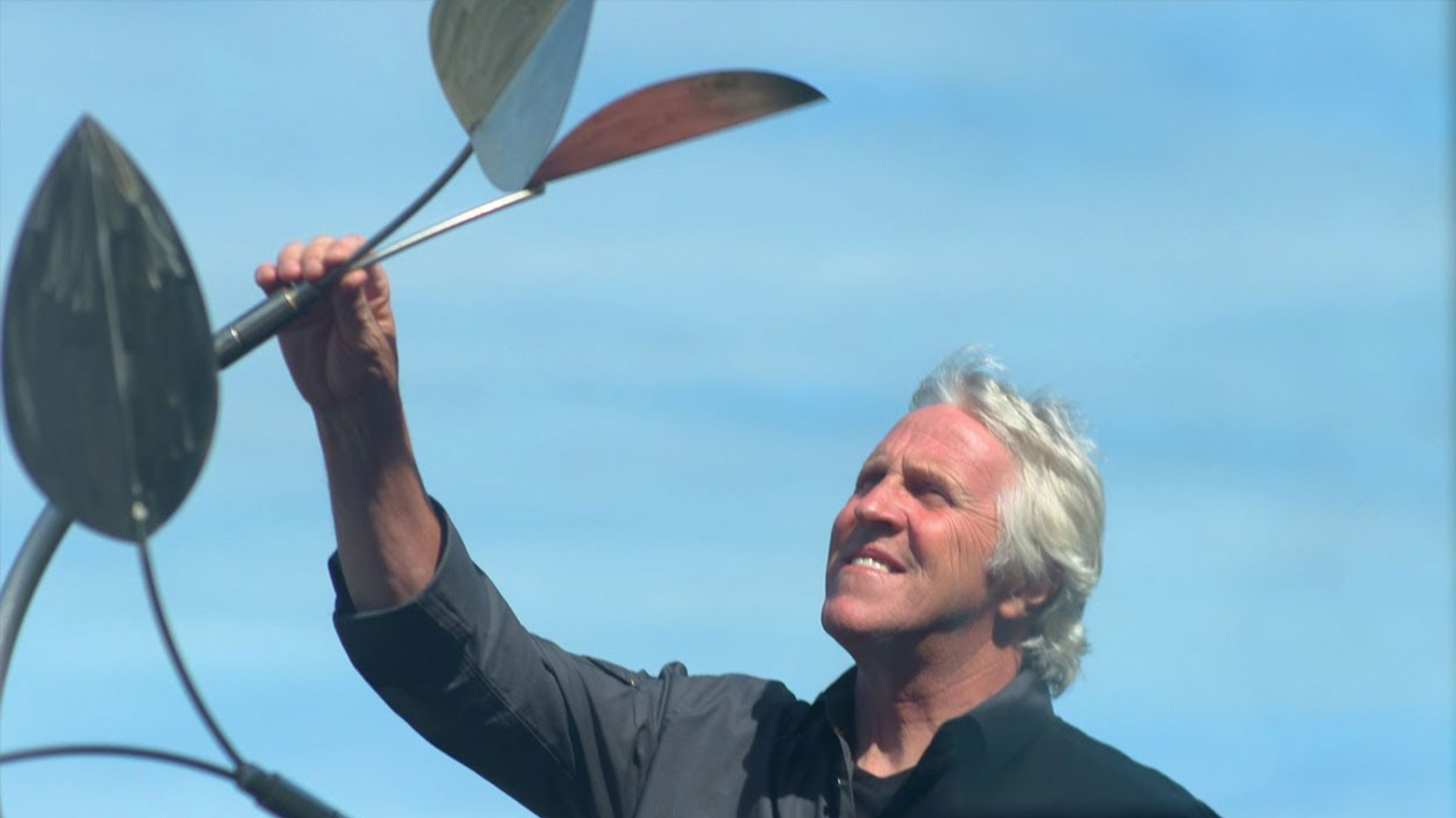 Rude Jass from Jess Designs inspects one of his wind sculptures