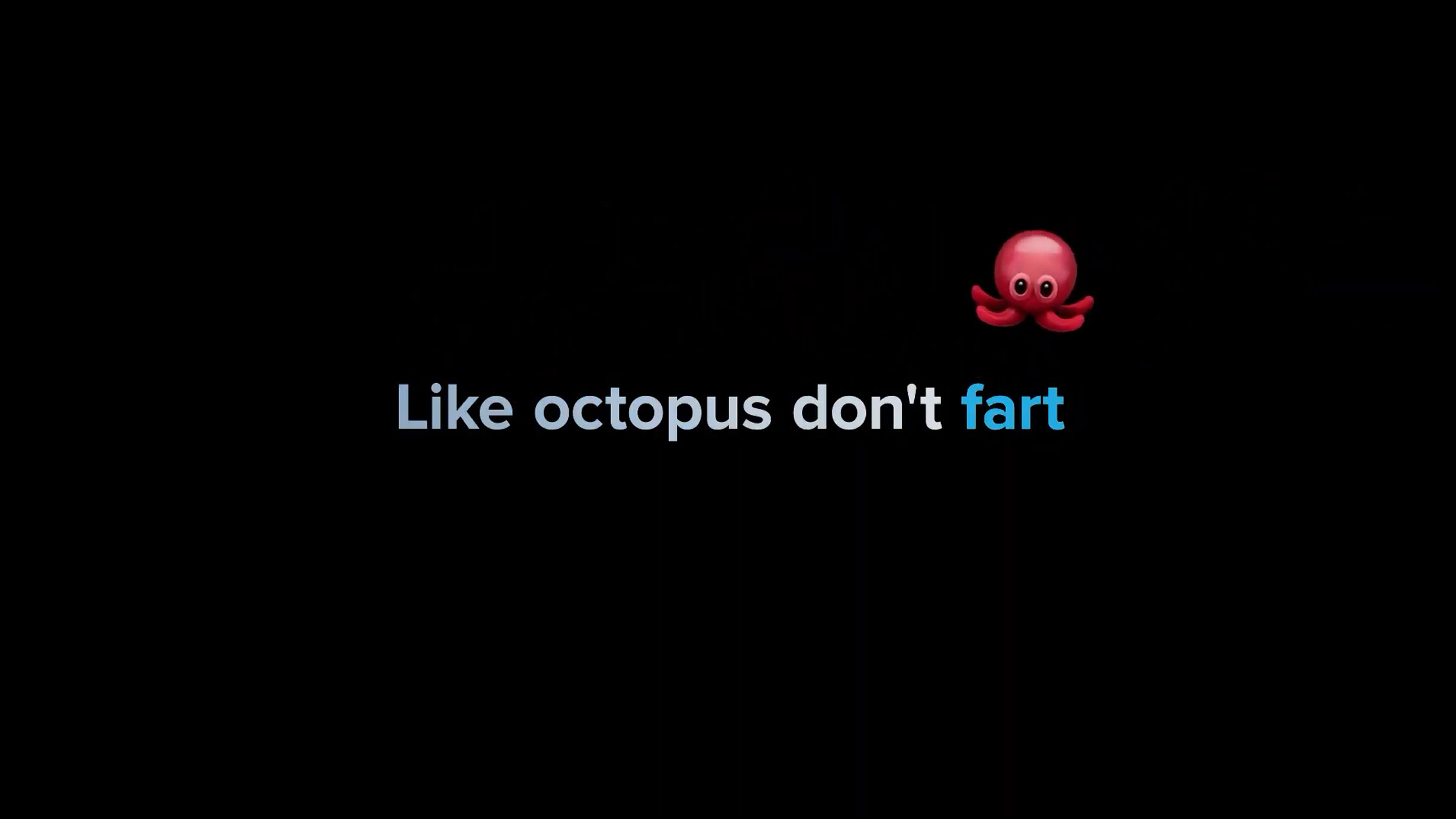 A still from the Love Song To The Internet video with the words "Octopus don't fart" and a octopus emoji hovering like a karaoke ball