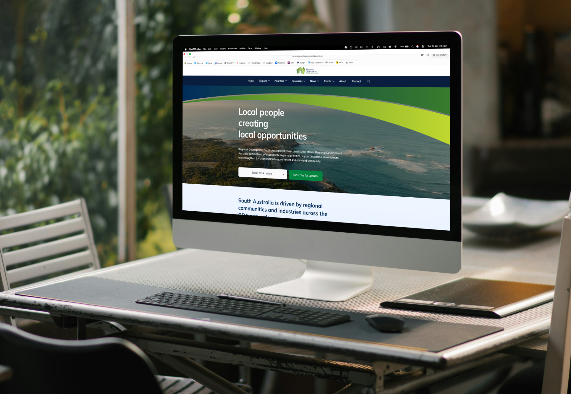 Regional Development South Australia website on a iMac computer outdoors on a table